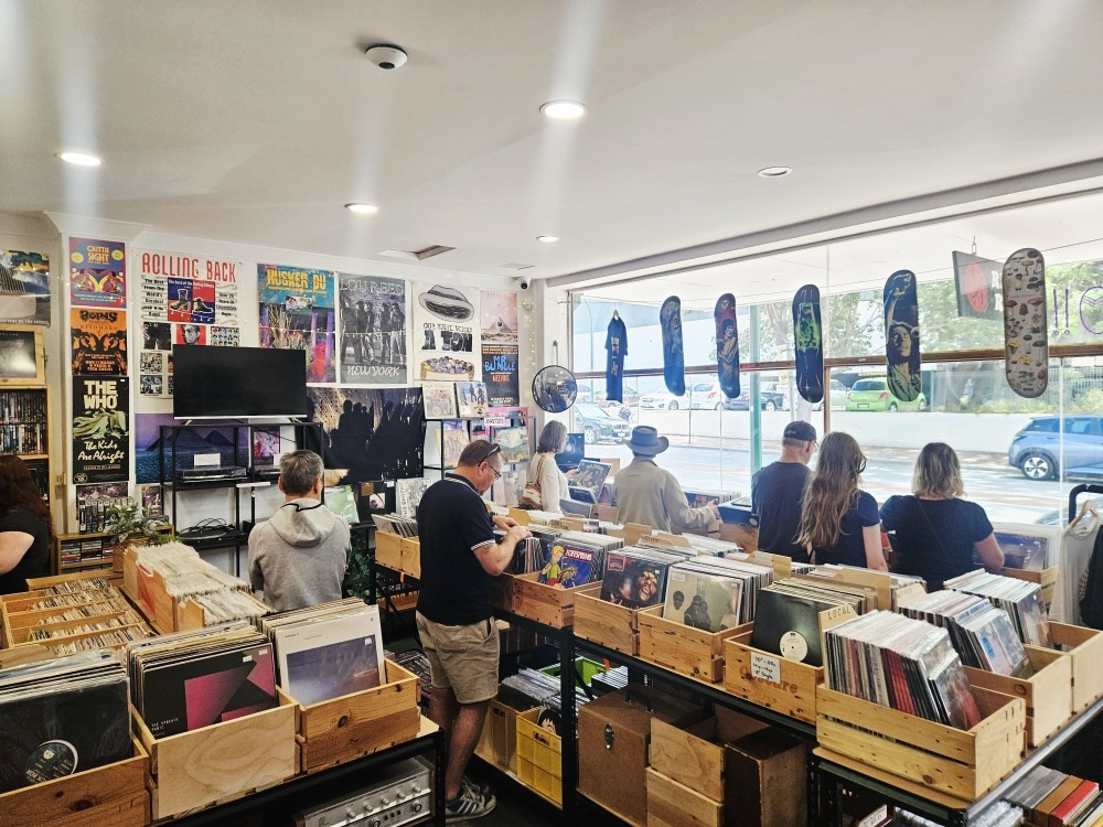 Customers flicking through the record crates inside the shop